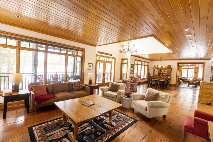 Living room with windows on the lake